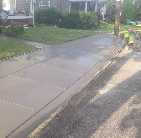 NYC sidewalk contractor team on site